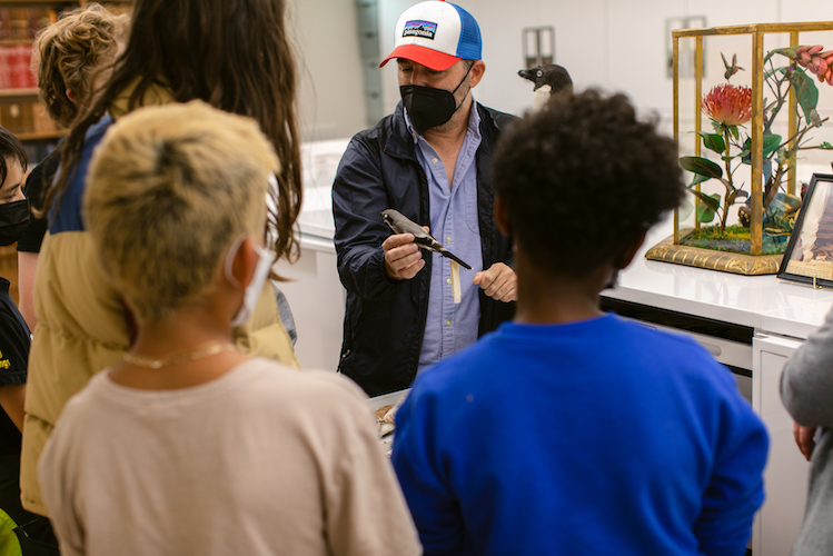 John McCormack giving a student group tour of the Moore Lab bird collection